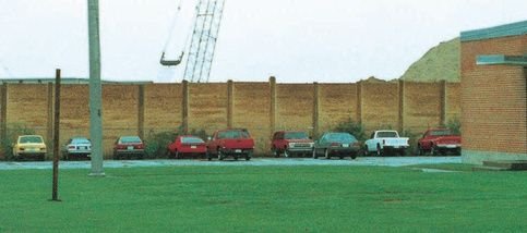 Plywall behind homes